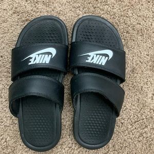 Black Nike slides
